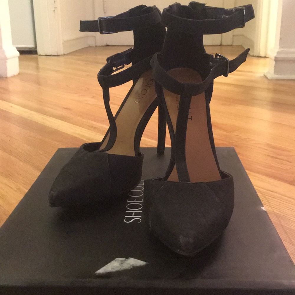 Black strappy pointy-toed heels
